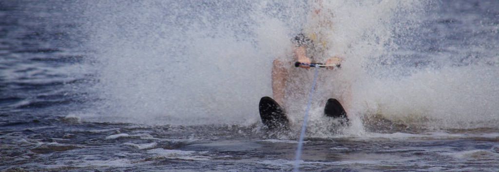 Waterskier masked by spray